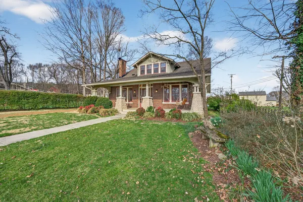 a outdoor living space with furniture and a potted plant