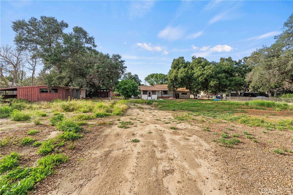 24811 Meadview Avenue Newhall, CA 91321 - Photo 17 of 73 a backyard of a house with lots of green space