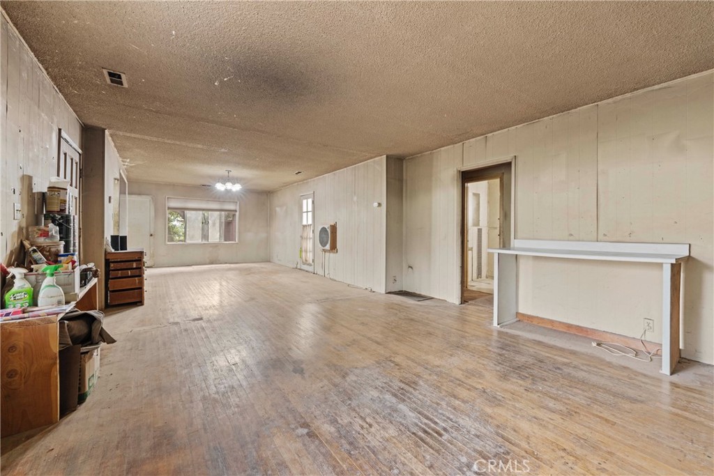 24811 Meadview Avenue Newhall, CA 91321 - Photo 27 of 73 a view of livingroom with hardwood floor and a ceiling fan