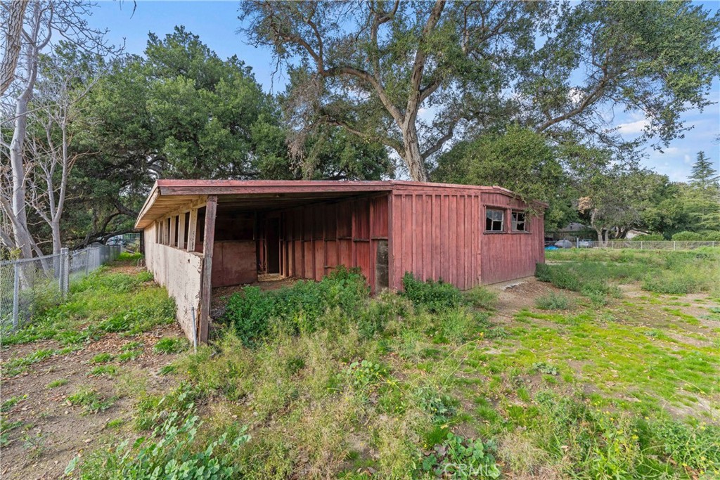 24811 Meadview Avenue Newhall, CA 91321 - Photo 47 of 73 a backyard of a house with lots of green space