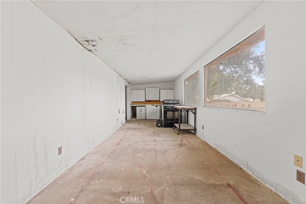 24811 Meadview Avenue Newhall, CA 91321 - Photo 49 of 73 a room with furniture and window