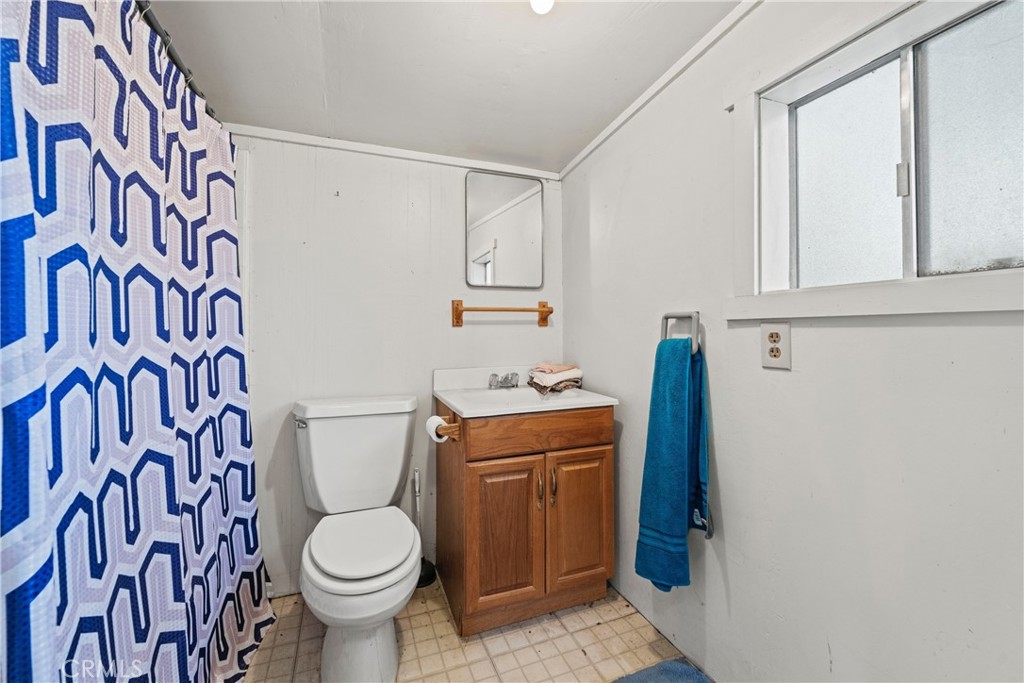 24811 Meadview Avenue Newhall, CA 91321 - Photo 52 of 73 a bathroom with a sink and toilet