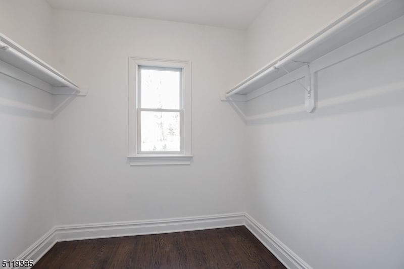 174 Main Street, Unit 2 Madison, NJ 07940 - Photo 13 of 18 a room that has a window in it