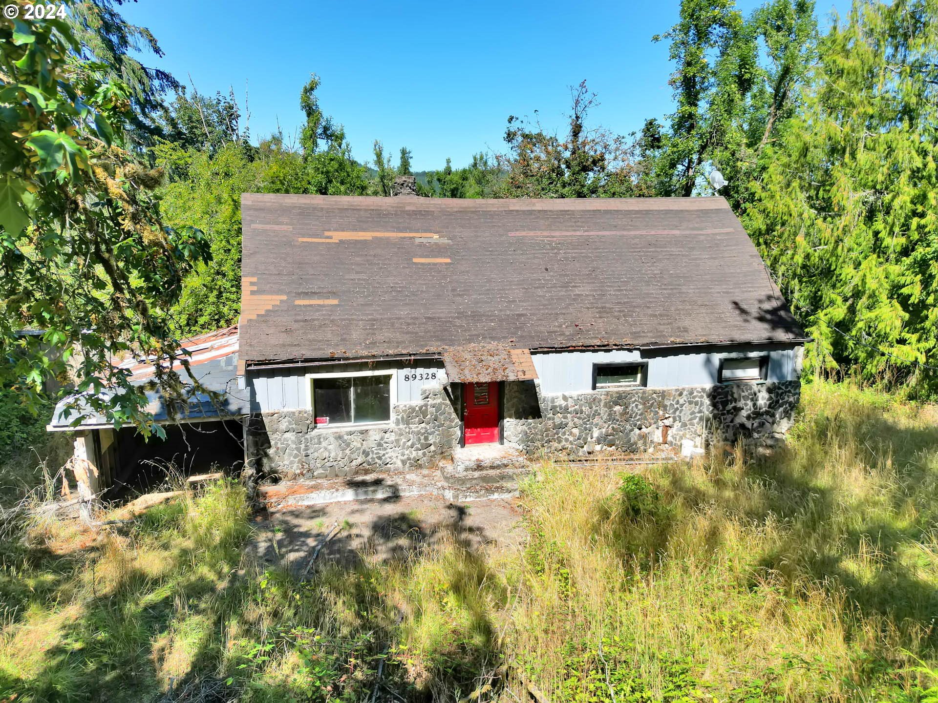 89328 Old Mohawk Road Springfield, OR 97478 - Photo 9 of 12 aerial view of house with yard and trees in the background