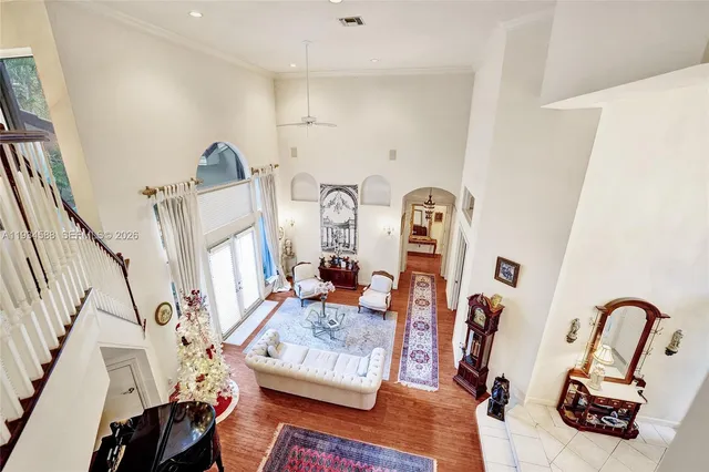 a view of living room with furniture and rug