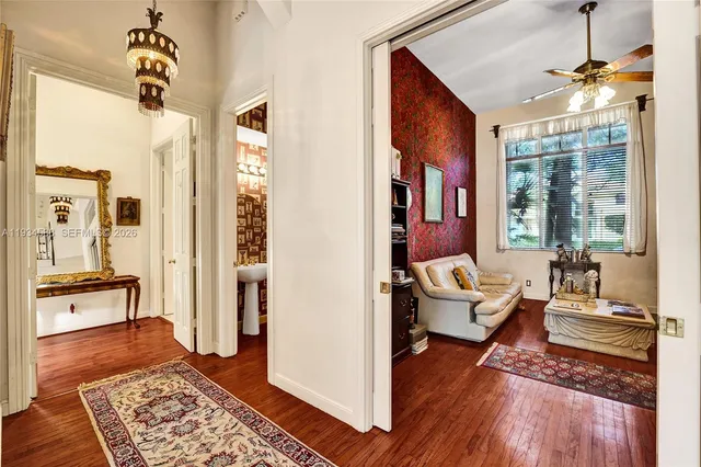 a living room with furniture and a rug