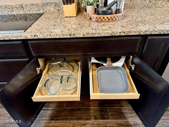 a room with furniture and view kitchen