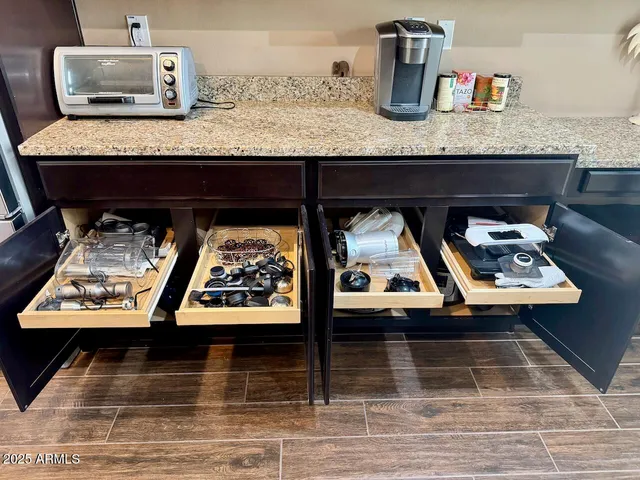 a view of kitchen and dining area with furniture