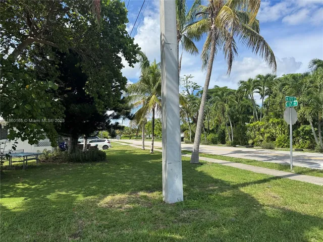 front view of a backyard with a garden