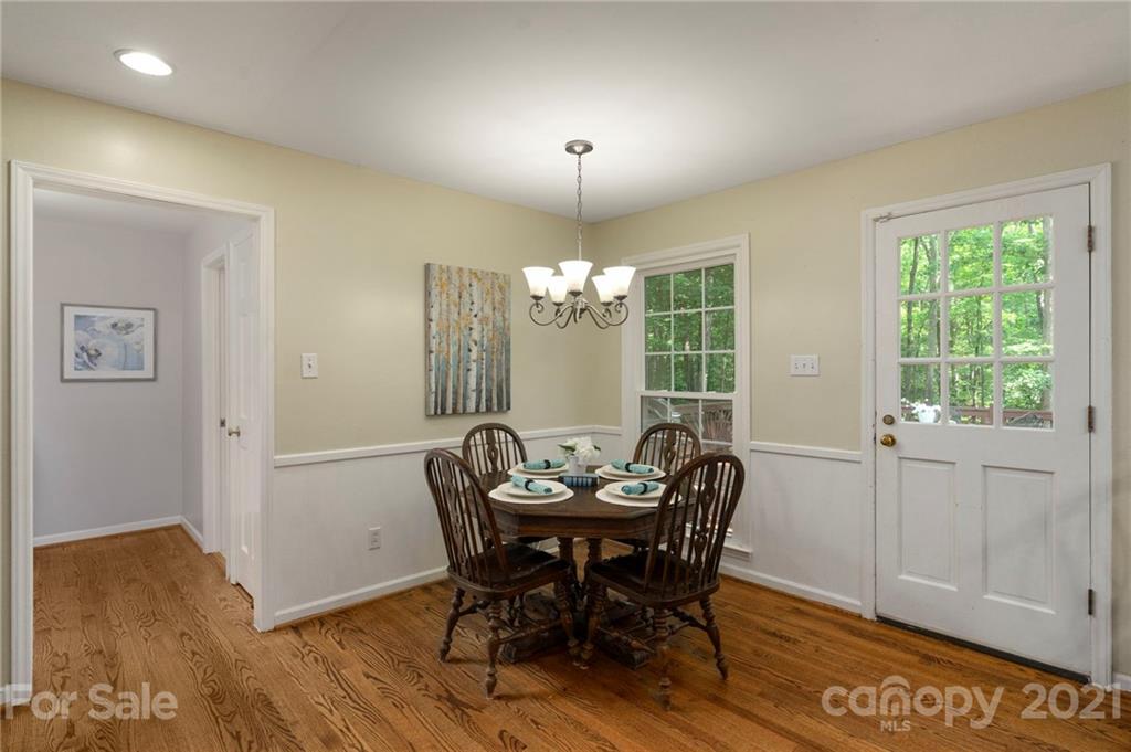 224 Raintree Drive Matthews, NC 28104 - Photo 13 of 48 a view of a dining room with furniture and window