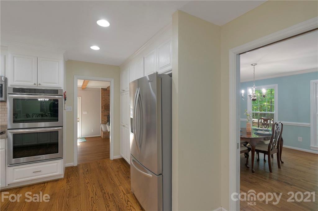 224 Raintree Drive Matthews, NC 28104 - Photo 14 of 48 a view of kitchen with furniture and stainless steel appliances