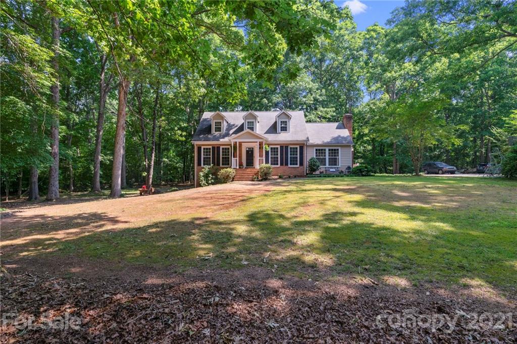 224 Raintree Drive Matthews, NC 28104 - Photo 37 of 48 a view of a house with a yard