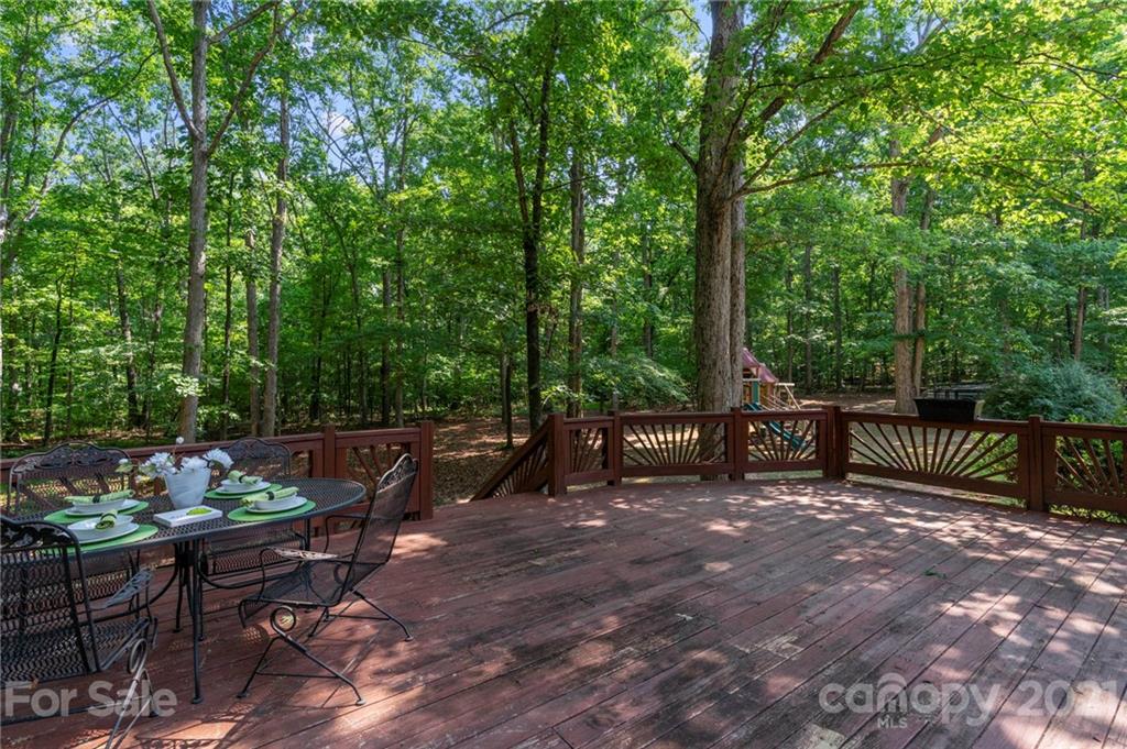 224 Raintree Drive Matthews, NC 28104 - Photo 42 of 48 a view of a chairs and tables in the patio