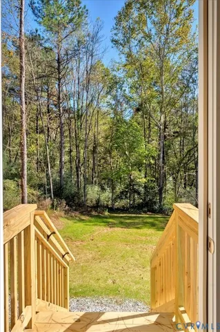 a view of swimming pool with outdoor seating and yard