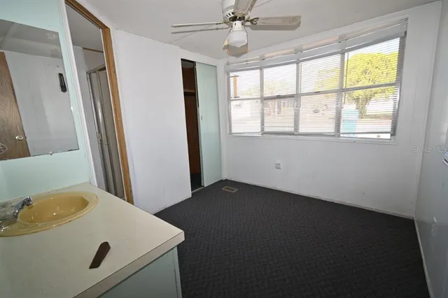 a view of a bathroom from a hallway