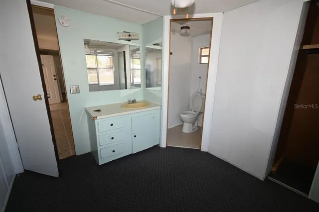 a view of a livingroom with furniture