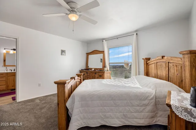a kitchen with stainless steel appliances granite countertop a stove sink microwave and refrigerator
