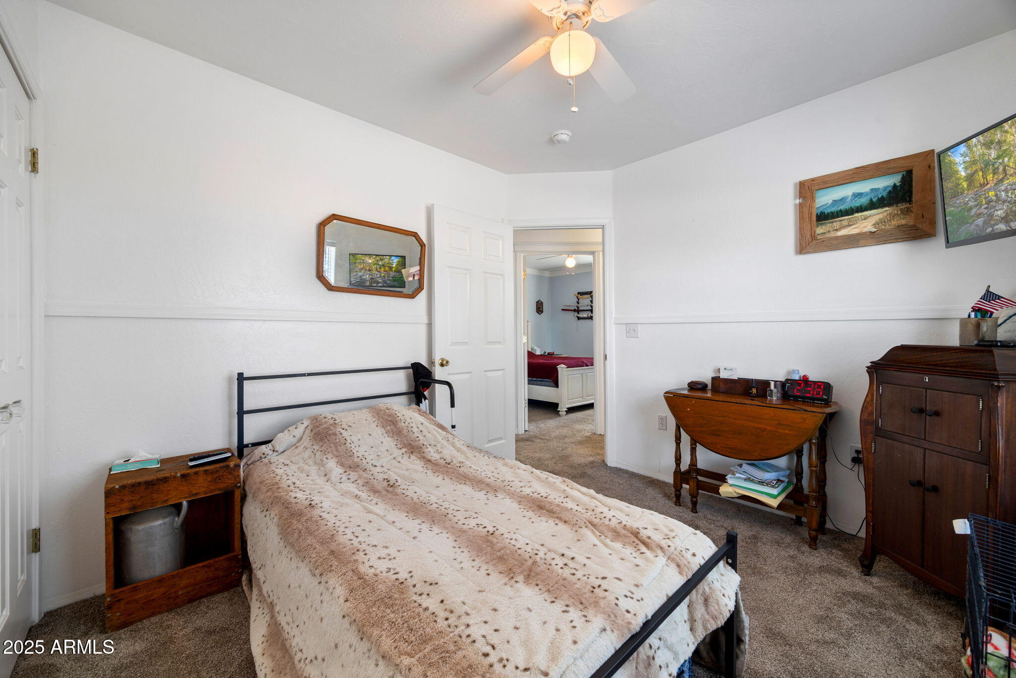 1689 Eager Avenue Snowflake, AZ 85937 - Photo 21 of 45 a bedroom with a bed and furniture