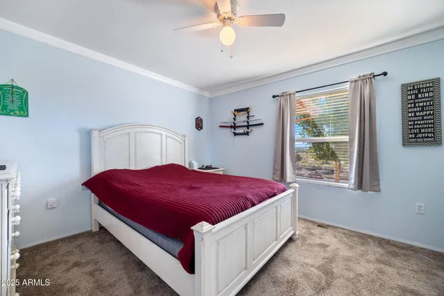 a bedroom with a bed and furniture