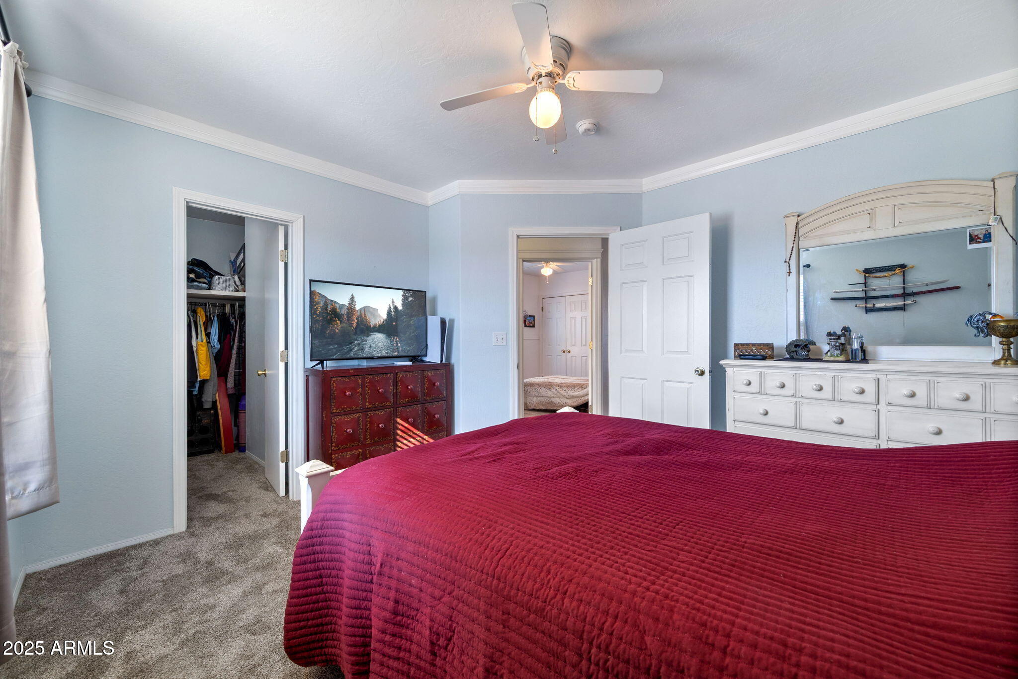 1689 Eager Avenue Snowflake, AZ 85937 - Photo 23 of 45 a bed room with a bed mirror and a night stand