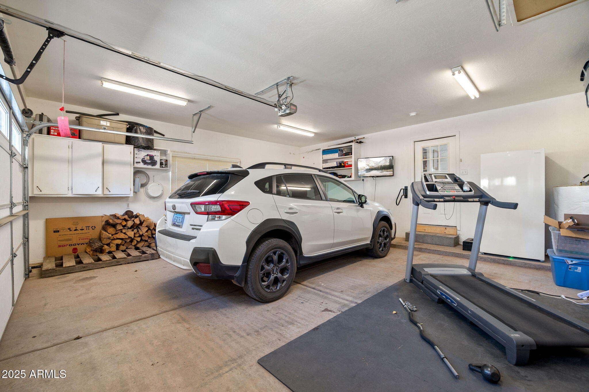 1689 Eager Avenue Snowflake, AZ 85937 - Photo 27 of 45 a car is parked in a garage