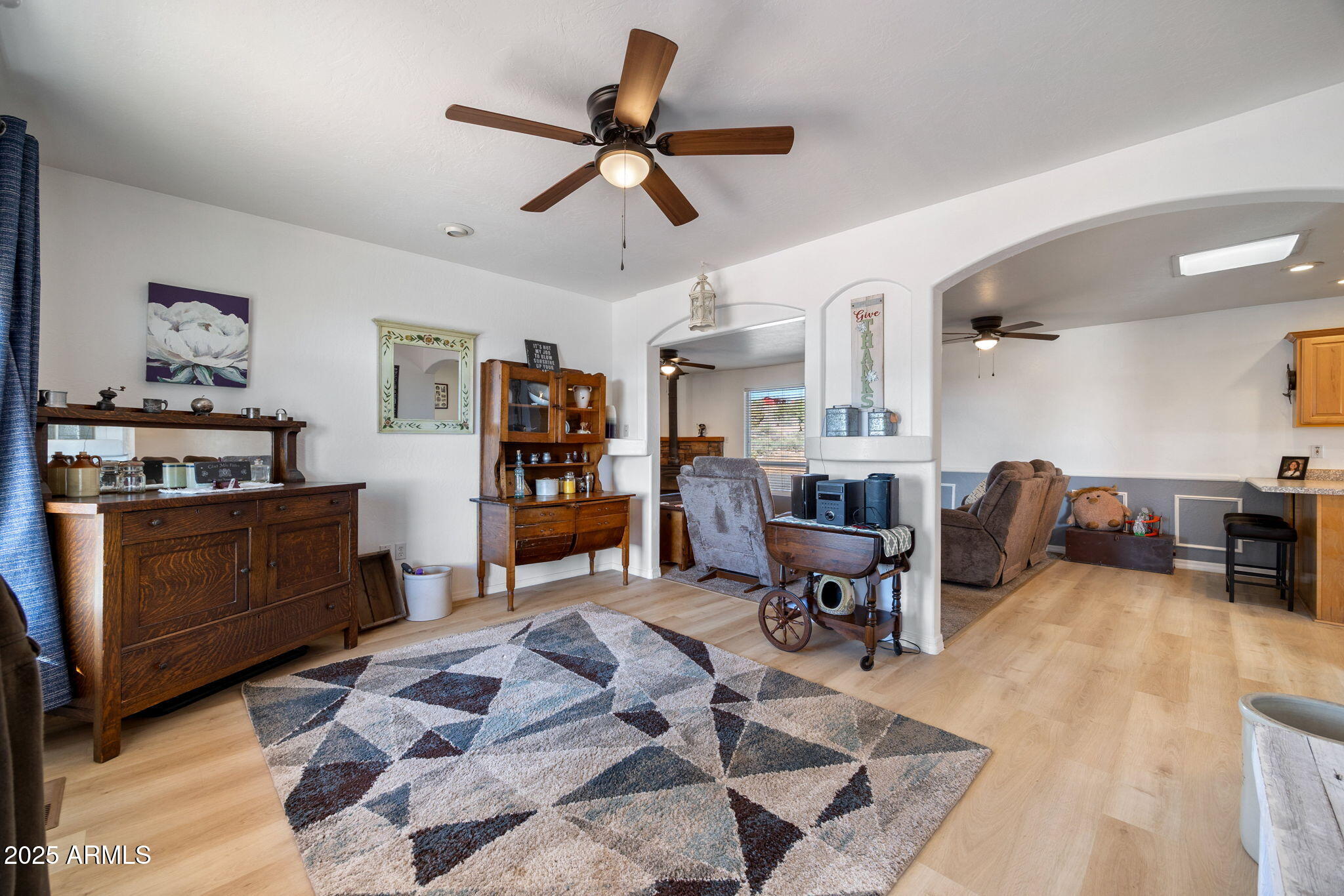 1689 Eager Avenue Snowflake, AZ 85937 - Photo 7 of 45 a living room with furniture kitchen view and a window