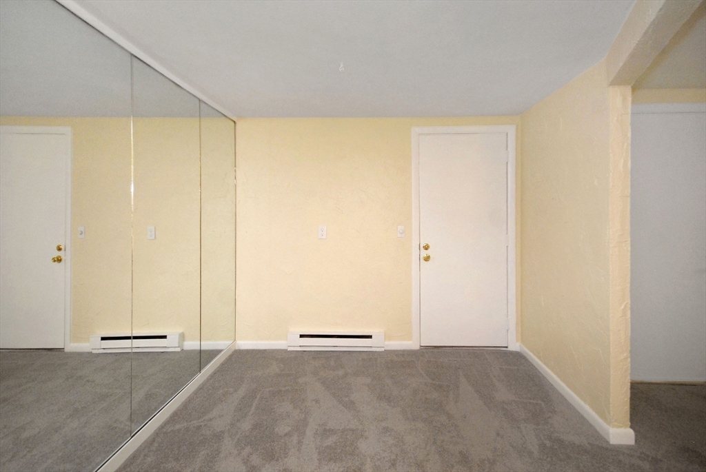 202 Swanson Road, Unit 515 Boxborough, MA 01719 - Photo 11 of 17 an empty room with a empty space