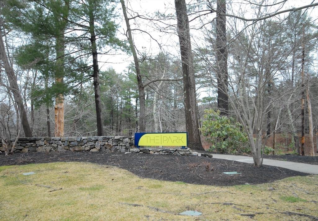 202 Swanson Road, Unit 515 Boxborough, MA 01719 - Photo 17 of 17 a view of a yard with trees