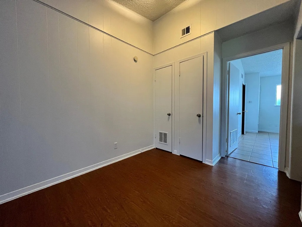 612 West 51st Street, Unit 101 Austin, TX 78751 - Photo 8 of 11 a view of a room with wooden floor