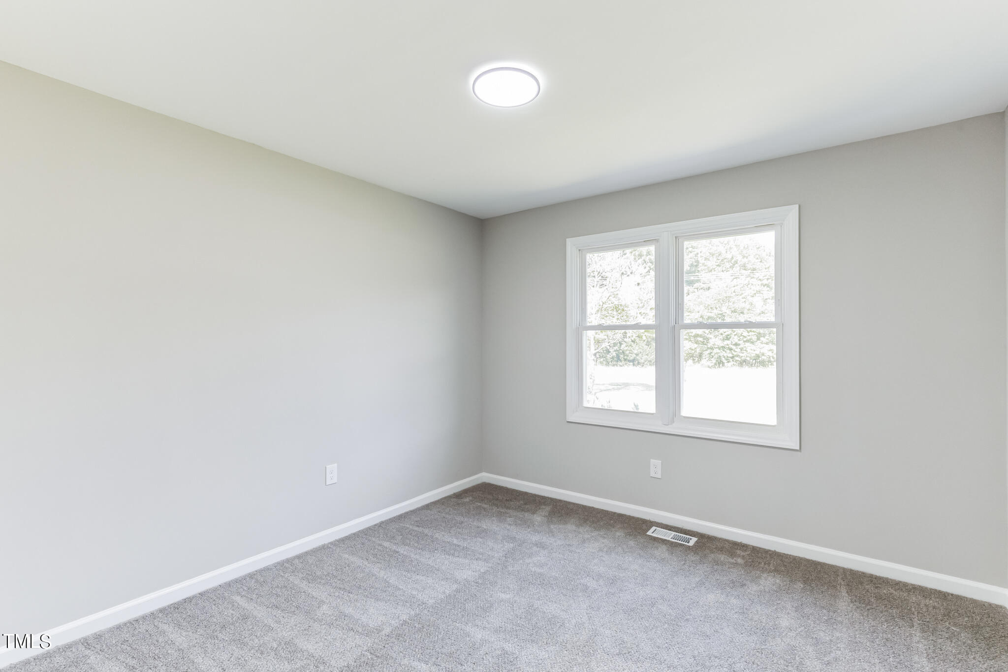 2395 Highway 210 Garland, NC 28441 - Photo 15 of 30 an empty room with a window