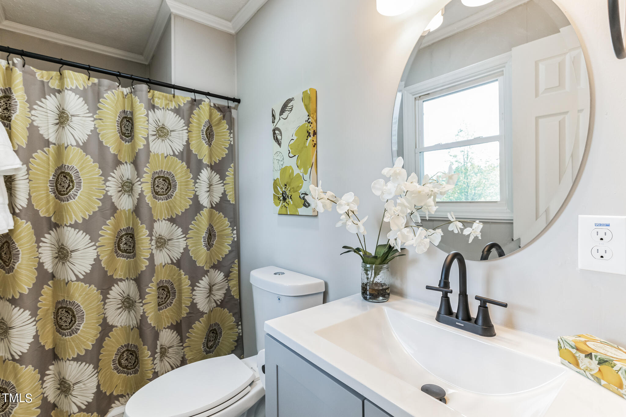 2395 Highway 210 Garland, NC 28441 - Photo 22 of 30 a bathroom with a sink a toilet and a shower curtain