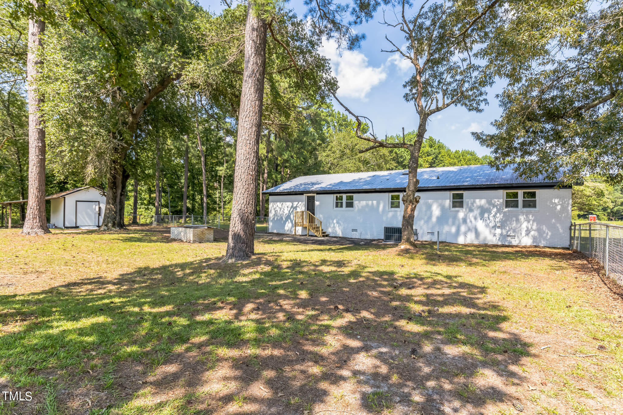 2395 Highway 210 Garland, NC 28441 - Photo 27 of 30 a view of a house with a yard