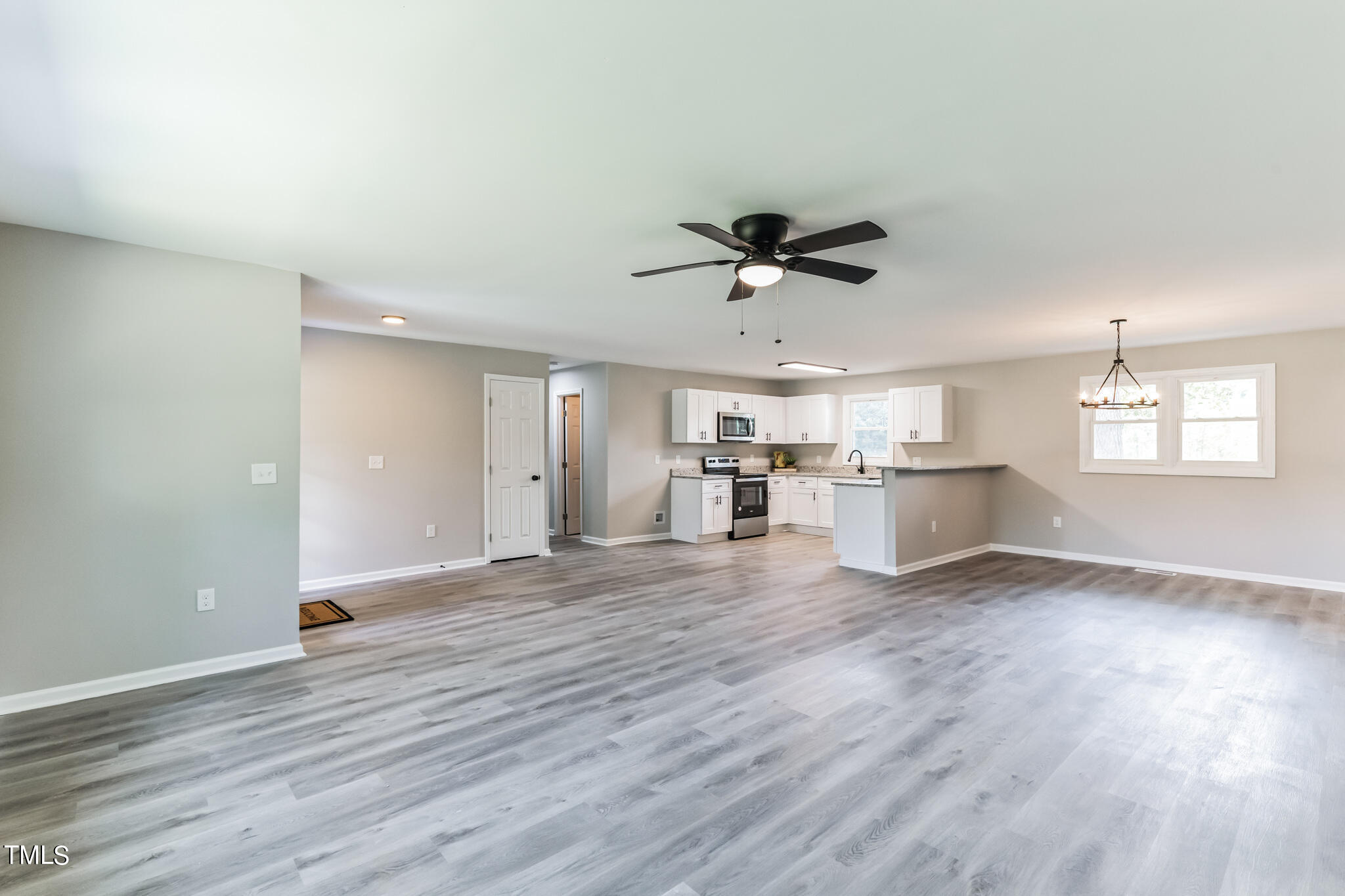 2395 Highway 210 Garland, NC 28441 - Photo 7 of 30 a view of a room with wooden floor and window