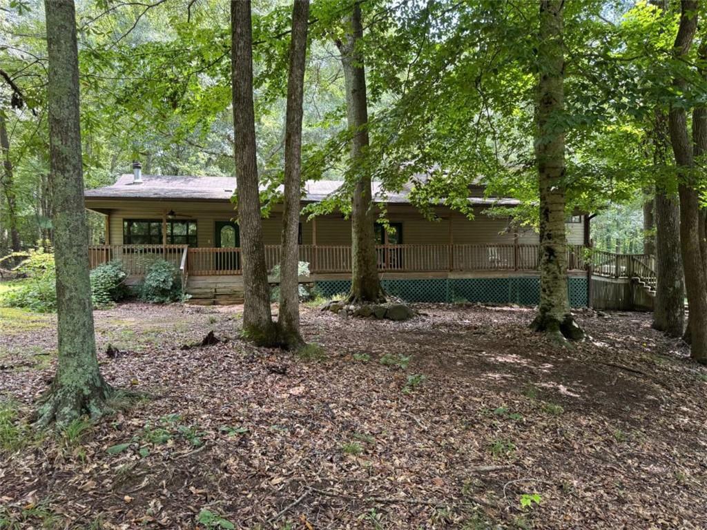 8265 High Point Road Douglasville, GA 30134 - Photo 1 of 1 a front view of a house with garden