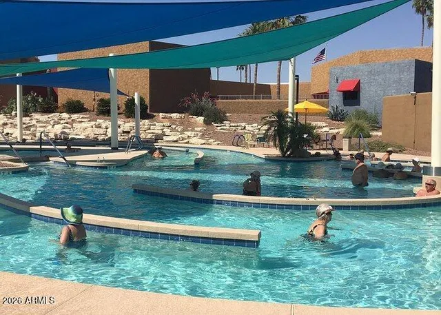 a backyard of a house with seating space