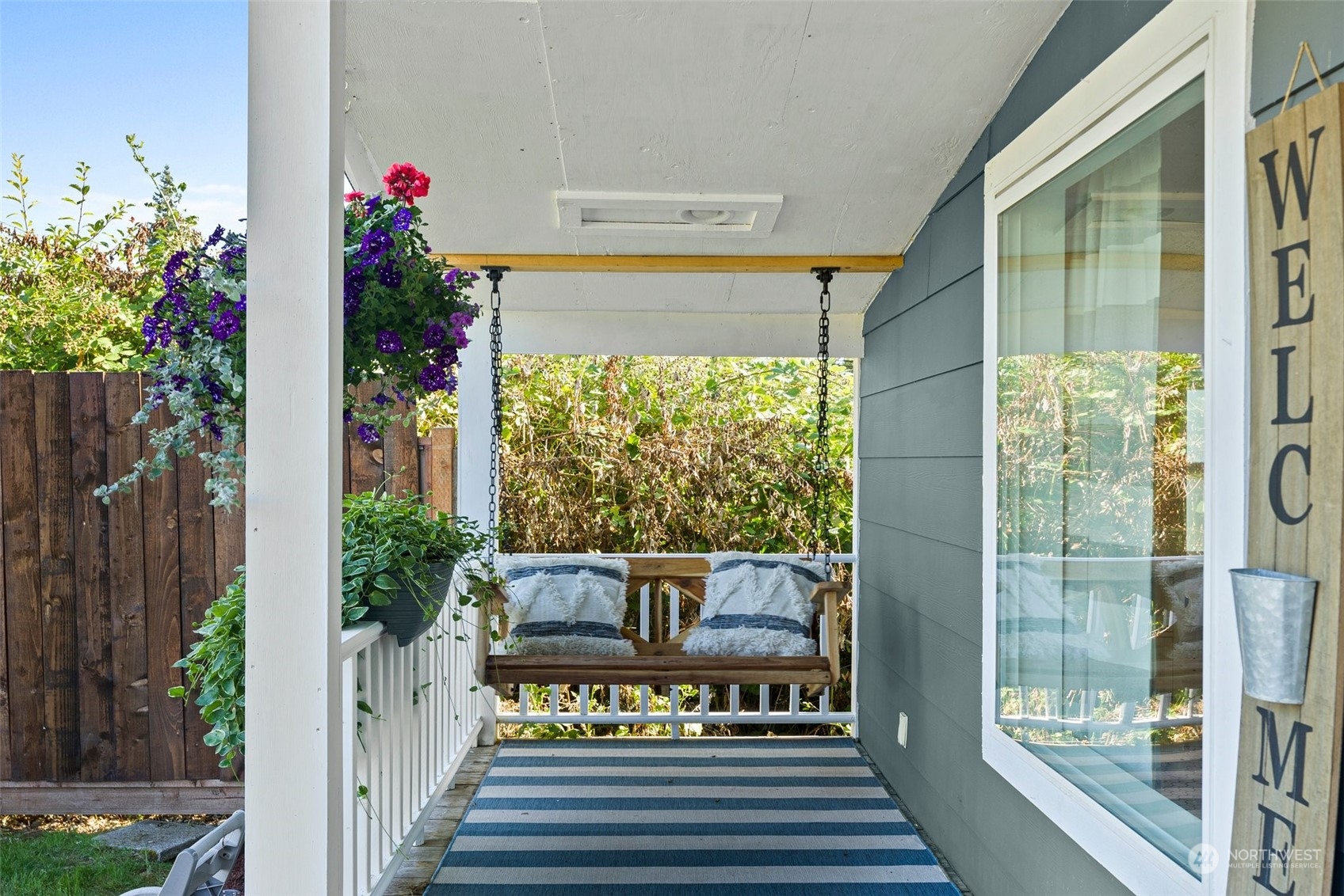 917 Garden Road Aberdeen, WA 98520 - Photo 3 of 31 a view of a entryway door and potted plants