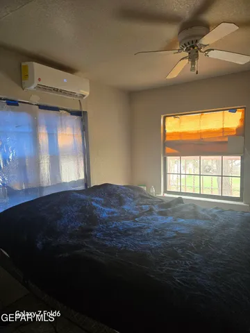 a bathroom with a toilet sink and shower