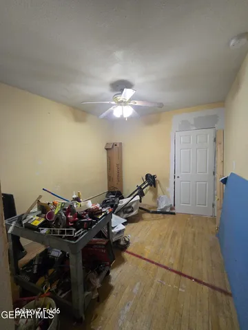 a kitchen with a stove and a refrigerator