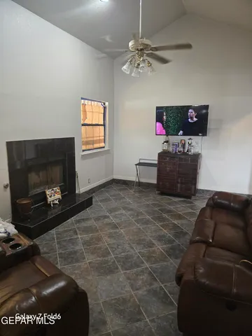 a large kitchen with a stove a sink dishwasher and a refrigerator