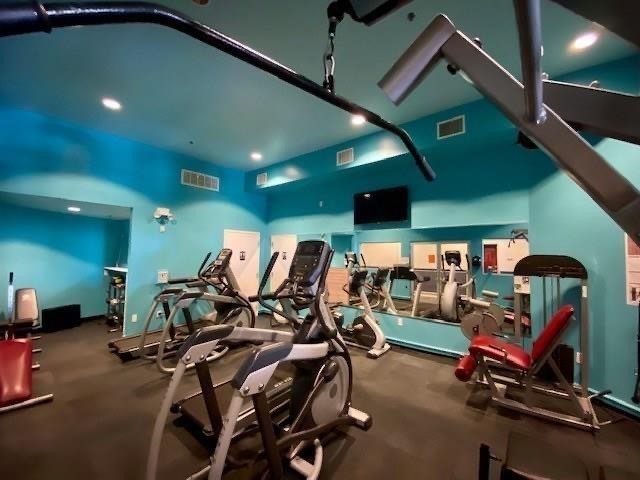 3311 Yupon Street, Unit 605 Houston, TX 77006 - Photo 14 of 16 Gym weights and treadmill/elliptical