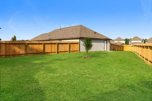 a house view with a garden space