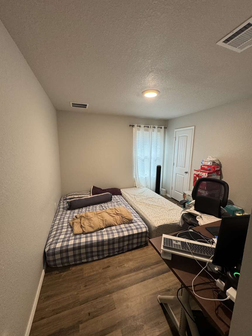 6320 Diamondleaf Bend Austin, TX 78724 - Photo 4 of 11 a room with gym equipment and wooden floor