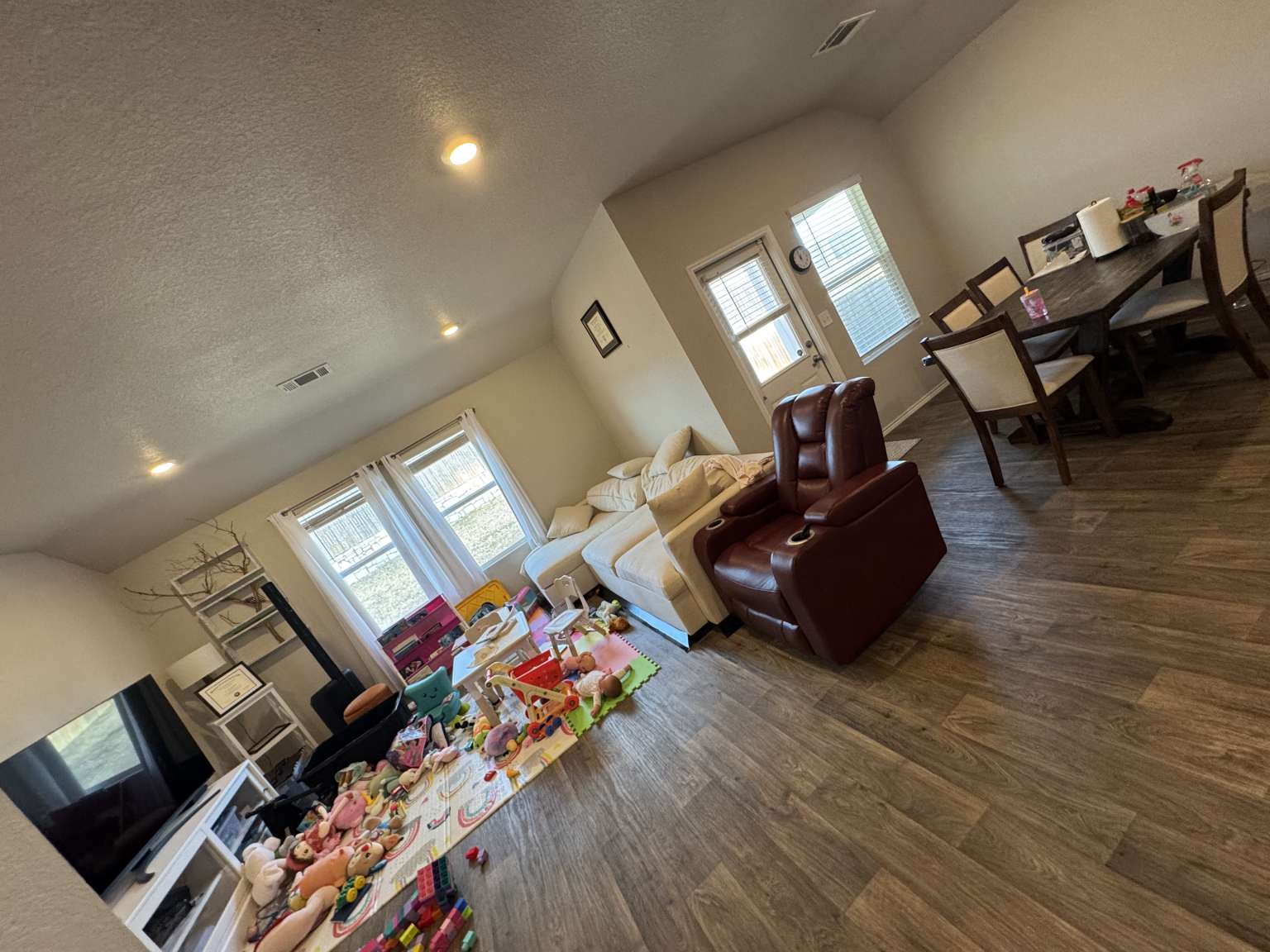 6320 Diamondleaf Bend Austin, TX 78724 - Photo 5 of 11 an living room with furniture and a wooden floor