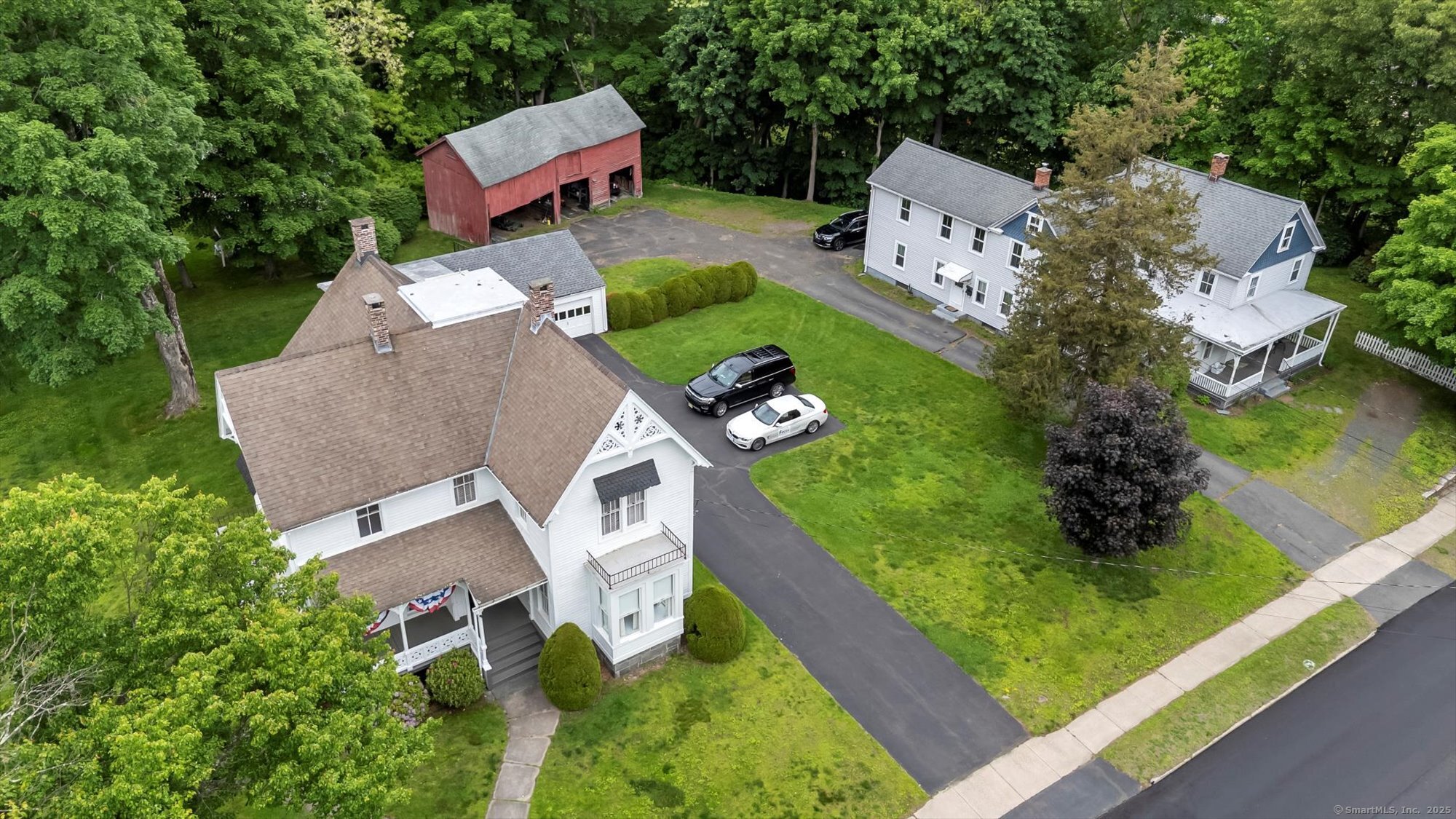 44 Maple Avenue Canton, CT 06019 - Photo 1 of 1 an aerial view of a house with a garden