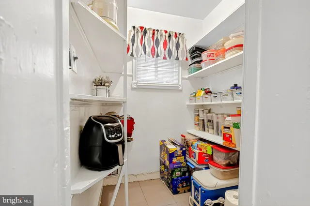 a view of a closet with storage