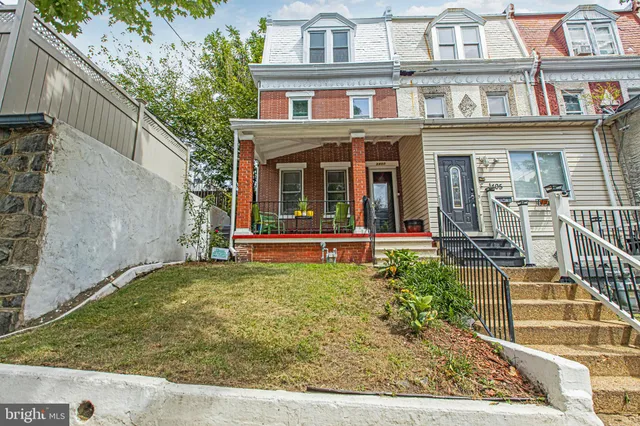 front view of a house with a large window