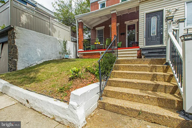 a view of swimming pool with a lounge chair