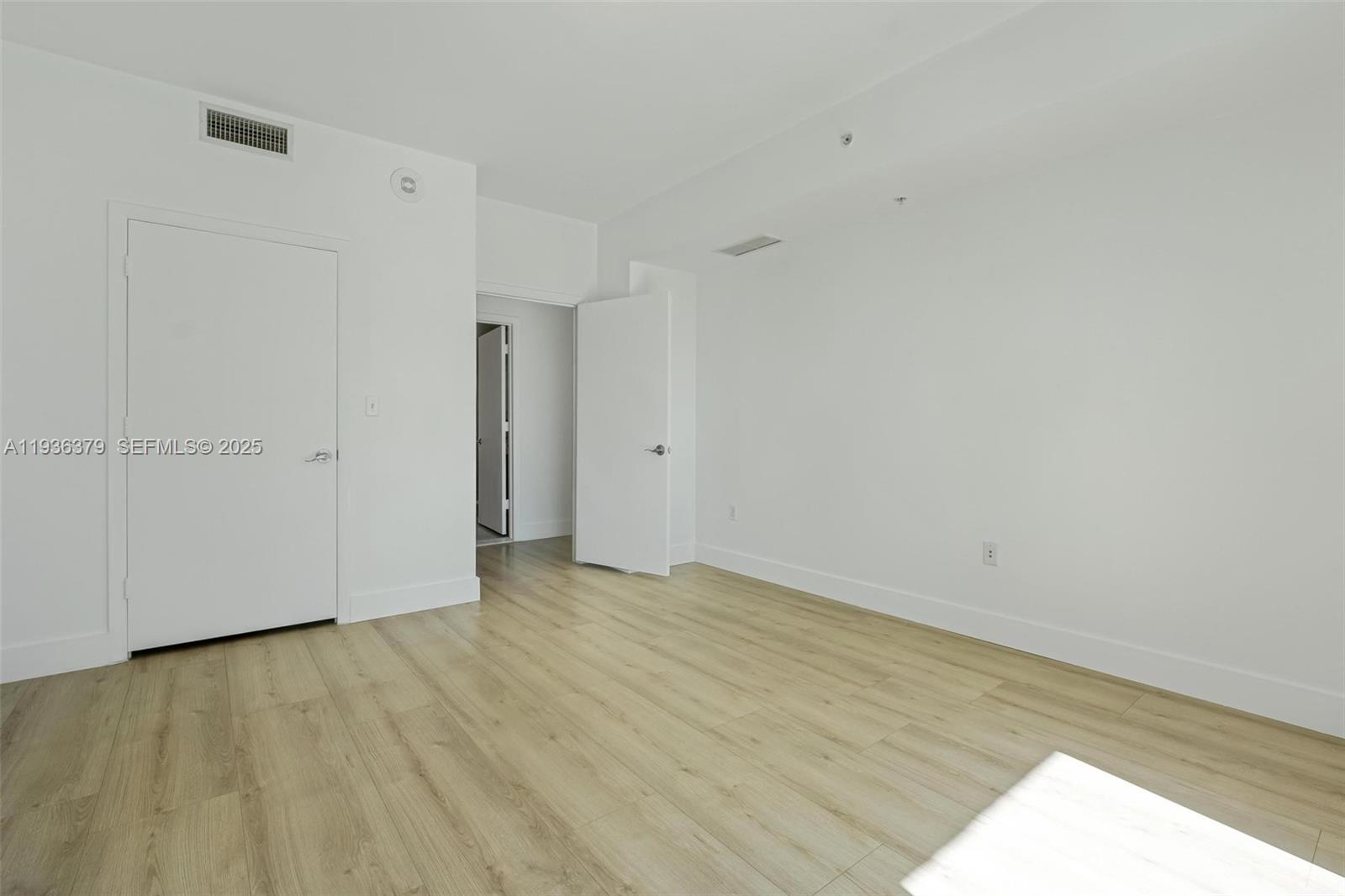 244 Biscayne Boulevard, Unit 1505 Miami, FL 33132 - Photo 11 of 25 a view of an empty room