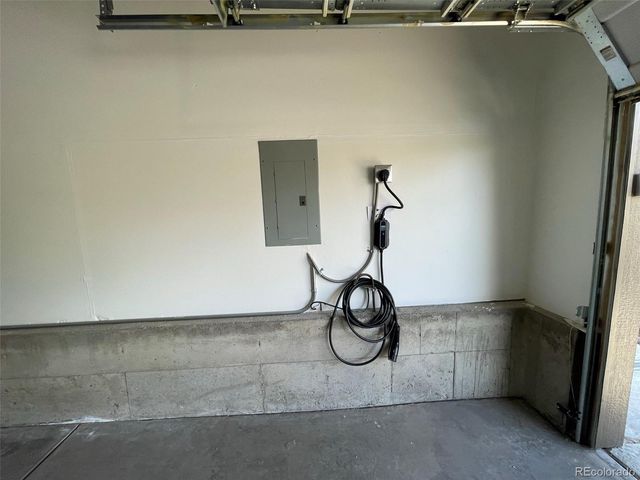 a bathroom with a shower and a window