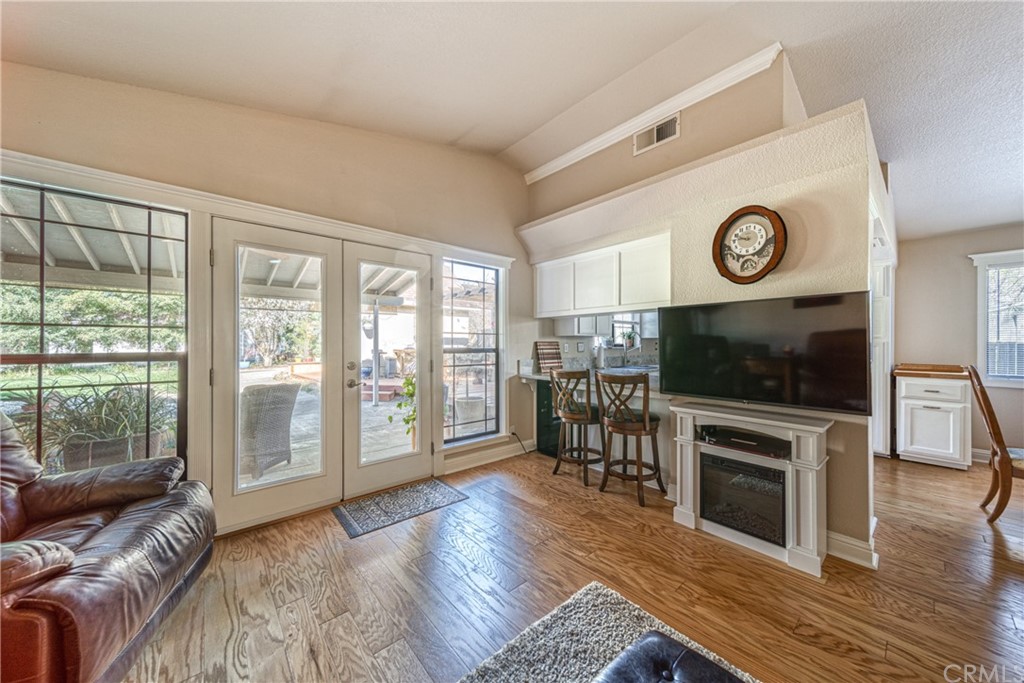 704 Miller Avenue Chico, CA 95928 - Photo 11 of 38 a living room with furniture and a flat screen tv